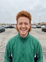 Parking lot photo of the red-haired man
